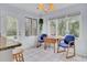 Bright breakfast nook with natural light, a small wood table, and tiled flooring at 1137 Windsome Pl, Mount Pleasant, SC 29464