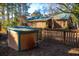 Charming cabin-style home with fenced yard, providing a cozy retreat in a serene natural setting at 120 Rancho Hippey Way, Saint George, SC 29477