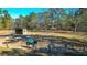 View of horse paddock area, fencing, and horse wearing blanket at 120 Rancho Hippey Way, Saint George, SC 29477
