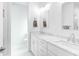 Modern bathroom featuring double sinks, white cabinetry, and contemporary fixtures at 1201 Gatch Ct, Mount Pleasant, SC 29464