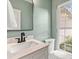 Stylish bathroom featuring a double vanity, matte black faucet and a glass-enclosed shower at 1294 Horseshoe Bnd, Mount Pleasant, SC 29464