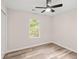 This bedroom is bathed in natural light with hardwood floors and neutral colors at 1294 Horseshoe Bnd, Mount Pleasant, SC 29464