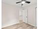 A bright bedroom showcases hardwood floors and a ceiling fan for added comfort at 1294 Horseshoe Bnd, Mount Pleasant, SC 29464