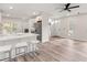 Modern kitchen with white cabinets, stainless steel appliances, and a breakfast bar at 1294 Horseshoe Bnd, Mount Pleasant, SC 29464