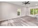 Open-concept living area with hardwood floors, large windows, and natural light at 1294 Horseshoe Bnd, Mount Pleasant, SC 29464