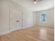 Light-filled bedroom with ceiling fan, double door closet and bright window view at 130 Marshside Dr, Summerville, SC 29485