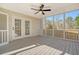 Screened-in porch showcasing a ceiling fan and natural light at 130 Marshside Dr, Summerville, SC 29485