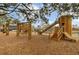 Community playground with a slide, climbing structure, and treehouse, great for  at 138 O'Malley Dr, Summerville, SC 29483