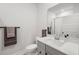 Bathroom with gray vanity, white toilet, and decorative towels at 1510 Martel St, Mount Pleasant, SC 29464