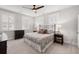 Bedroom with a bed, dark wood furnishings, neutral carpet, and abundant natural light at 1510 Martel St, Mount Pleasant, SC 29464