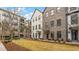 Elegant townhomes with well-maintained lawns, sidewalks, and attractive landscaping at 1510 Martel St, Mount Pleasant, SC 29464