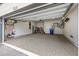 Well-organized garage with sealed floor, shelving, and bicycle storage at 1510 Martel St, Mount Pleasant, SC 29464