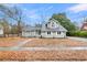 Charming exterior featuring neutral siding, white trim, and well-maintained landscaping at 1545 Sterling Oaks Dr, Moncks Corner, SC 29461