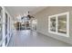 The screened-in porch features views of the neighborhood at 1545 Sterling Oaks Dr, Moncks Corner, SC 29461
