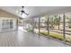 The screened-in porch features views of the backyard at 1545 Sterling Oaks Dr, Moncks Corner, SC 29461