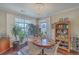 Elegant dining room featuring a chandelier and ample natural light at 1608 Fetterbush Ln, Johns Island, SC 29455