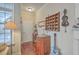 Charming entryway with hardwood floors, decorative wall art, and natural light at 1608 Fetterbush Ln, Johns Island, SC 29455