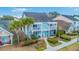 Beautiful two-story home featuring dual balconies and manicured landscaping, creating inviting curb appeal at 1608 Fetterbush Ln, Johns Island, SC 29455