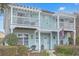 Charming two-story townhouse with dual balconies and a welcoming facade at 1608 Fetterbush Ln, Johns Island, SC 29455