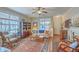 Cozy living room with natural light, hardwood floors, and decorative furnishings at 1608 Fetterbush Ln, Johns Island, SC 29455