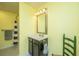 Bathroom featuring a modern vanity, a framed mirror, a tub/shower with shower curtain at 206 President Cir, Summerville, SC 29483