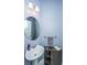 Half bath with a pedestal sink, updated lighting, and modern fixtures at 206 President Cir, Summerville, SC 29483