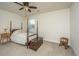 Cozy bedroom featuring carpet floors, ceiling fan, and four post bed at 206 President Cir, Summerville, SC 29483