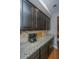 Kitchen counter featuring granite counters and decorative backsplash at 206 President Cir, Summerville, SC 29483