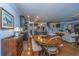 Open living room with hardwood floors and view to kitchen at 206 President Cir, Summerville, SC 29483