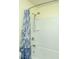 Bright white shower featuring a mounted shower head, new hardware, and modern patterned shower curtain at 206 President Cir, Summerville, SC 29483