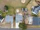 Overhead view of a home with a large yard, deck, storage shed, and established landscaping at 209 Persimmon Cir, Goose Creek, SC 29445