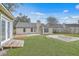 Large backyard with a grass area and a deck at 209 Persimmon Cir, Goose Creek, SC 29445