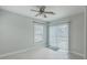 Bright dining area with tile floors, natural light, and sliding door to yard at 209 Persimmon Cir, Goose Creek, SC 29445