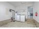 Garage featuring washer, dryer and water heater at 209 Persimmon Cir, Goose Creek, SC 29445