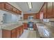 Well-lit kitchen with granite countertops, stainless steel appliances, and ample cabinetry at 209 Persimmon Cir, Goose Creek, SC 29445