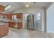 Bright kitchen with stainless steel appliances, granite countertops, and tile floors at 209 Persimmon Cir, Goose Creek, SC 29445