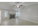 Bright living room featuring tile floors, fireplace, and large windows at 209 Persimmon Cir, Goose Creek, SC 29445