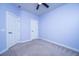 Serene bedroom with plush carpet and ceiling fan, offering a cozy and inviting space at 219 Corvus St, Summerville, SC 29483