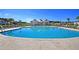 A pristine community pool with ample lounge seating offers a relaxing and inviting atmosphere at 295 Calm Water Way, Summerville, SC 29486