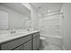 Bright bathroom with double vanity, framed mirror, and shower at 296 Firewheel Ct, Summerville, SC 29486