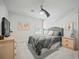 Cozy bedroom featuring carpet, a queen bed, neutral walls and ceiling fan at 296 Firewheel Ct, Summerville, SC 29486