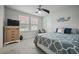 Bright bedroom with ceiling fan, natural light, and modern decor at 296 Firewheel Ct, Summerville, SC 29486