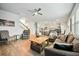 Spacious open-concept living room with hardwood floors and ample natural light at 296 Firewheel Ct, Summerville, SC 29486