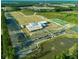 Aerial view of a Cane Bay YMCA including sports fields, parking and ponds in a community setting at 296 Firewheel Ct, Summerville, SC 29486