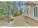 Relaxing backyard retreat with a wooden swing set and lush greenery at 301 E Richardson Ave, Summerville, SC 29483