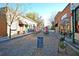 Charming downtown street with brick buildings and outdoor dining creating a vibrant and inviting atmosphere at 301 E Richardson Ave, Summerville, SC 29483