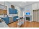 Bright kitchen features white countertops, stainless steel appliances, and convenient center island at 301 E Richardson Ave, Summerville, SC 29483