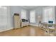 Bright office space with a large desk and natural light, perfect for a productive work environment at 301 E Richardson Ave, Summerville, SC 29483