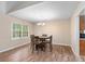 Cozy dining room featuring a chandelier and a wood table with seating for four at 303 Hamlet Rd, Summerville, SC 29485