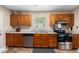 Efficient kitchen design featuring stainless steel appliances and wood-look flooring at 303 Hamlet Rd, Summerville, SC 29485